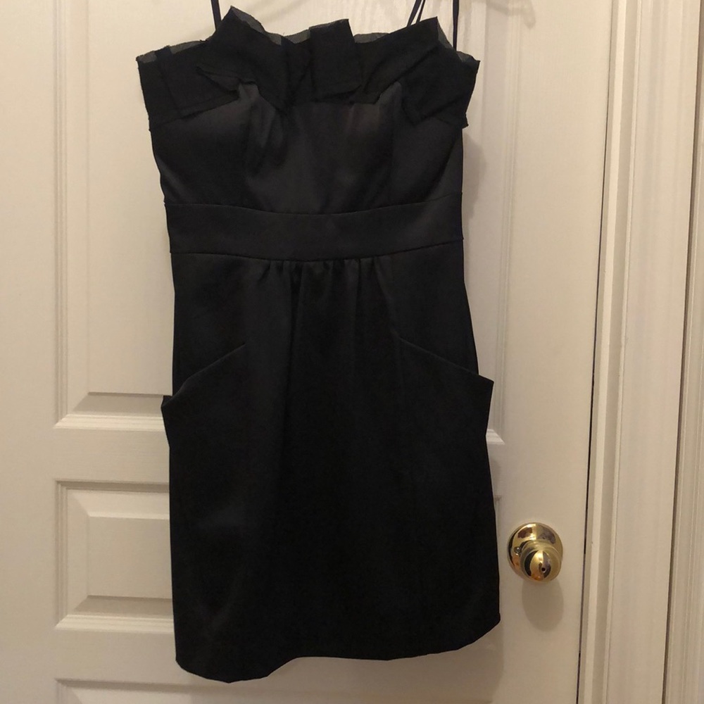Strapless black satin dress with pockets
